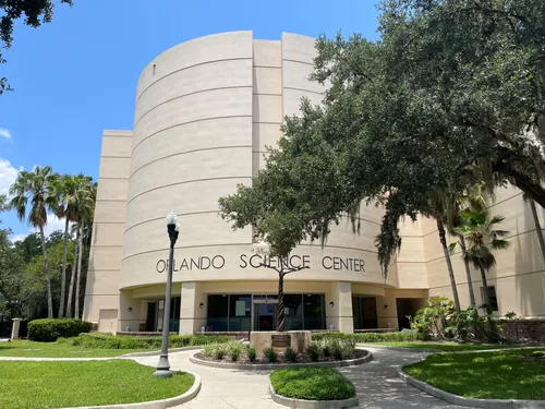 The cylindrical east section of the Orlando Science Center on a sunny day