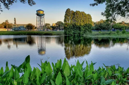 Water tower beyond the calm surface of Crescent Lake