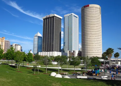 The park's playground area with tall buildings behind