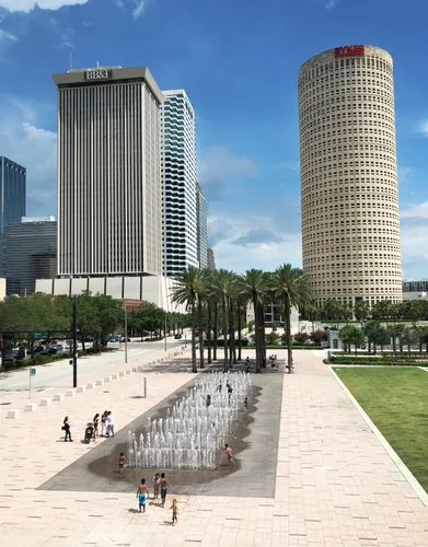Children playing with water features and fountains