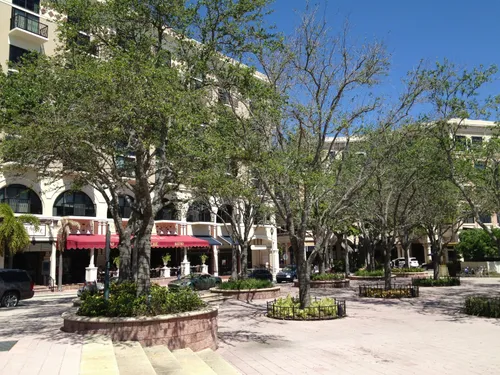 Courtyard plaza with trees and storefronts