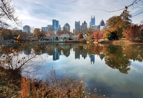 Lake Clara Meer with the Piedmont Park Bath House and Atlanta's skyline behind