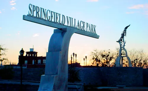A tall entry sign welcomes visitors to Springfield Village Park