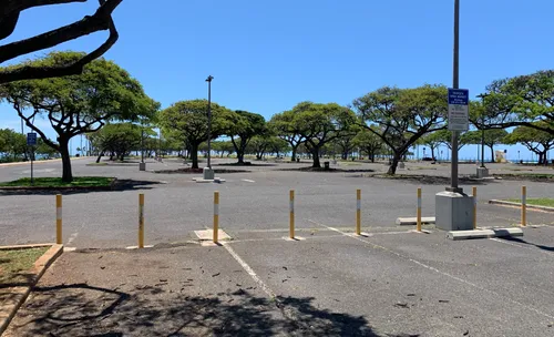 A large parking lot is located in the park's east section