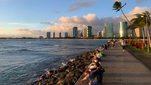Visitors taking in the breathtaking scenery at sundown
