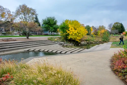 A scenic crossing over Waubonsie Creek with terraced stone steps along the water
