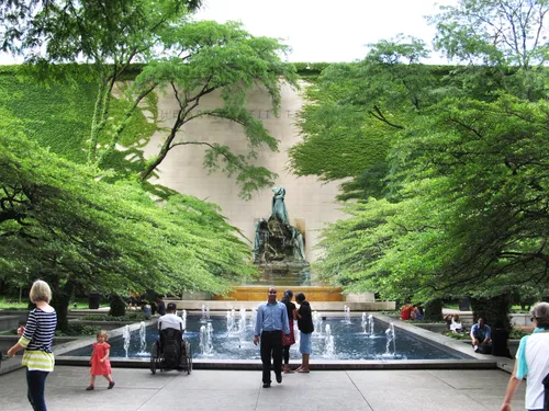 Visitors admiring the Fountain of the Great Lakes