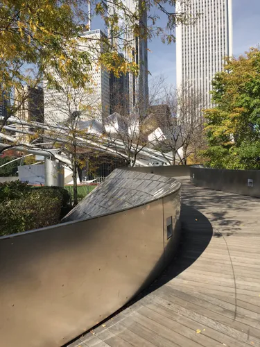 The sculptural BP Pedestrian Bridge connects the park with Millennium Park