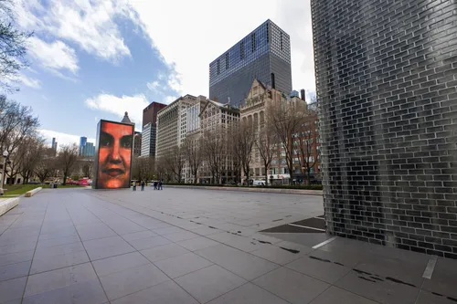The two digital displays of Crown Fountain tower over the plaza