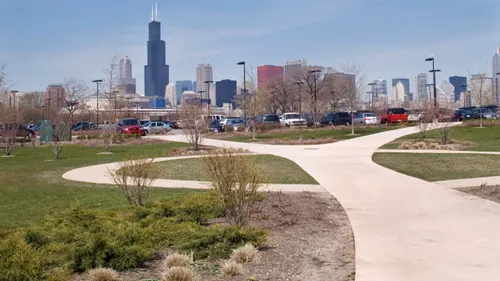 Walking paths offer views of downtown Chicago across the parkland