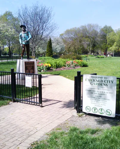 Entrance to the Emerald City Gardens with Scarecrow statue visible
