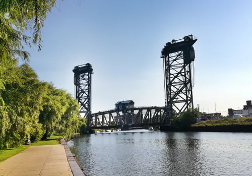 The historic Amtrak South Branch Bridge spans the river