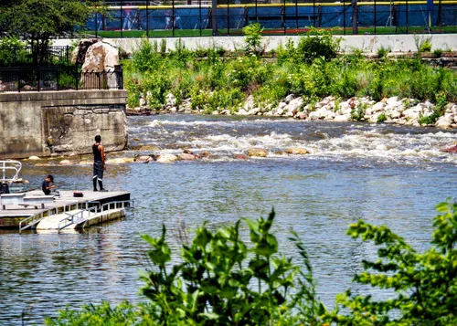 The North Branch Chicago River flows through the park, with rapids visible