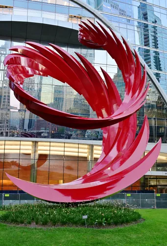 Vibrant red Constellation sculpture creates artistic focal point in the park