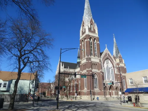 Gothic spires of Saint Michael the Archangel Church at the park's northeast corner