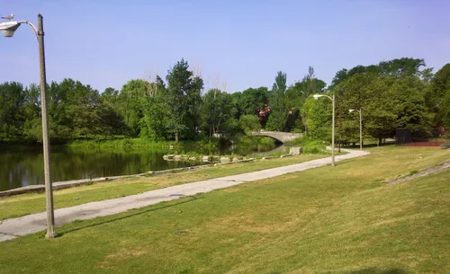Open lawns and paths near the fieldhouse on a sunny afternoon