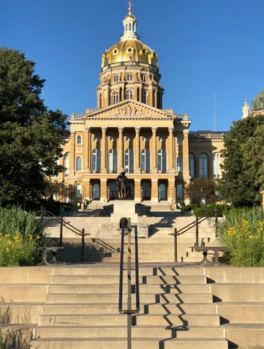 Sweeping staircase leading up to the grand Iowa State Capitol