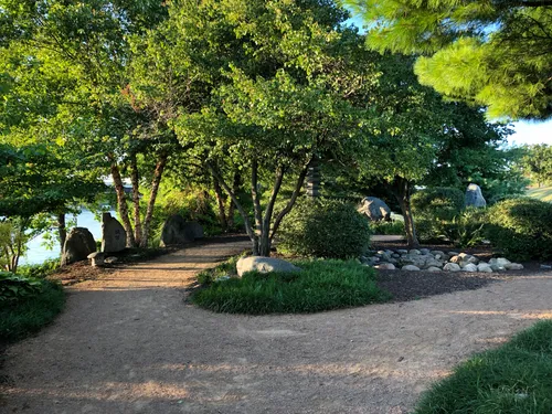 Shaded gravel paths lead visitors along the Path for Harmony