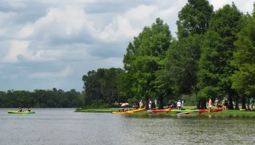 Kayakers gather along the park's lakeshore