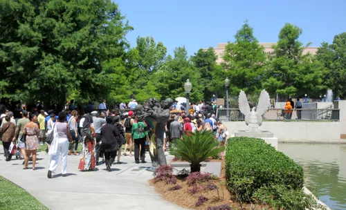 Visitors strolling along the pathways on a busy day