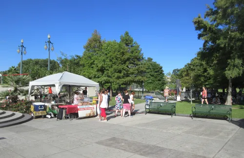 Vendor booths set up along the park's paved areas