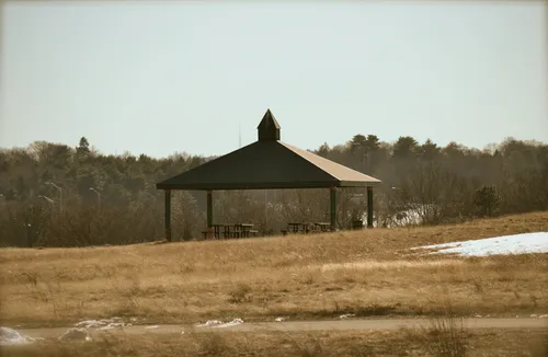 One of the park's picnic shelters sits in the open winter landscape, waiting for spring