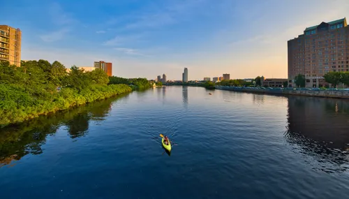 Kayaker paddling the tranquil waters of the river