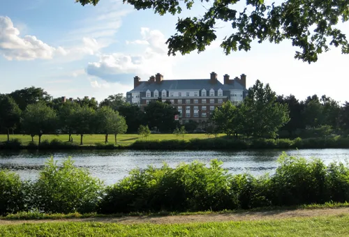 Historic Harvard building overlooking the waters of the Charles River