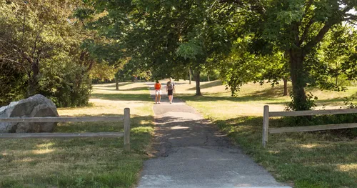 A pathway leads visitors into the park