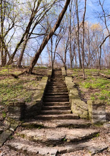Stone stairs lead up toward Riverside Park