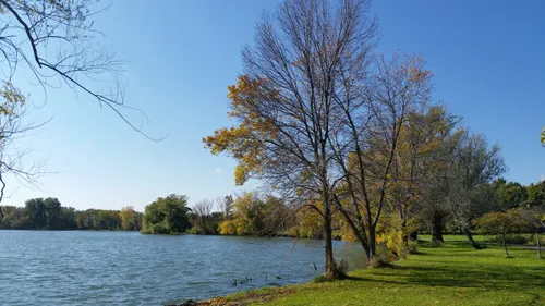 Lake Nokomis as trees begin their fall transition