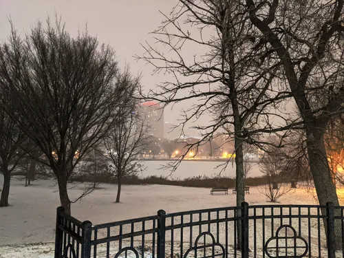 Loring Pond seen through bare trees on a quiet winter day