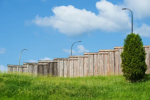 This wooden sound barrier runs along the park's western edge near I-94 and Lyndale Avenue