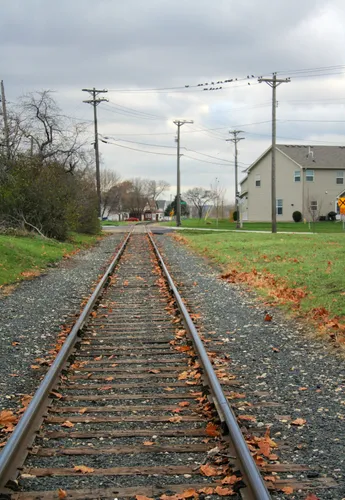 Railroad tracks run alongside the Bay Street green space