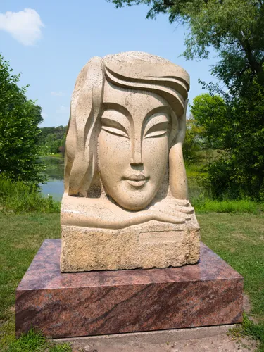 The limestone sculpture Meditation was created by Lei Yixin