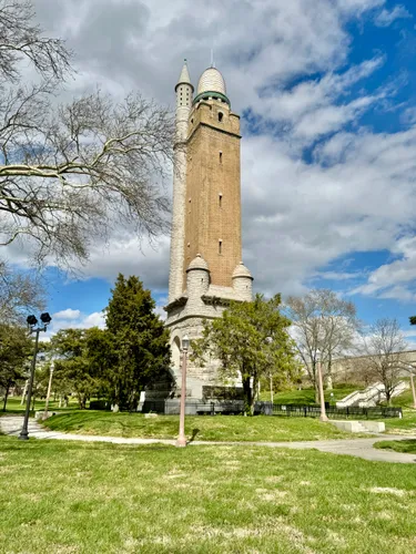 The historic Compton Hill Water Tower rises against a blue sky