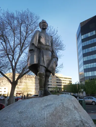 The bronze statue of Major General Jesse Lee Reno is mounted on a granite boulder