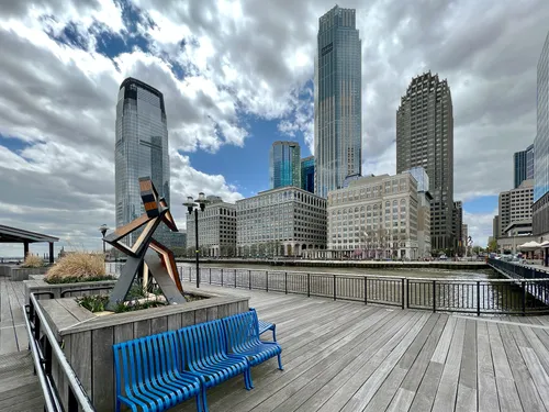 The Jersey City waterfront on a quiet afternoon in the park