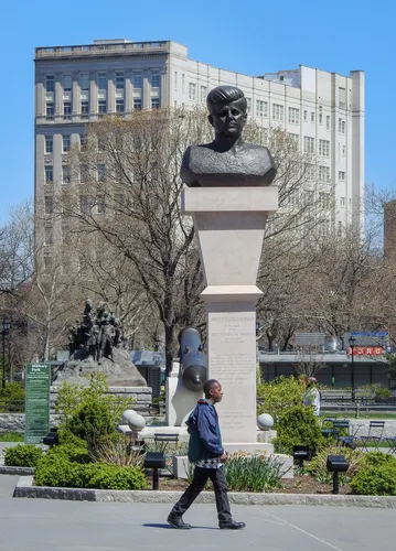 The bronze bust of John F. Kennedy by Jacques Lipchitz anchors the plaza