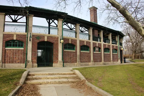 The brick grandstand structure at the tip of the park's baseball field