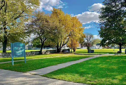 A view of the park grounds at the north entrance on a sunny day