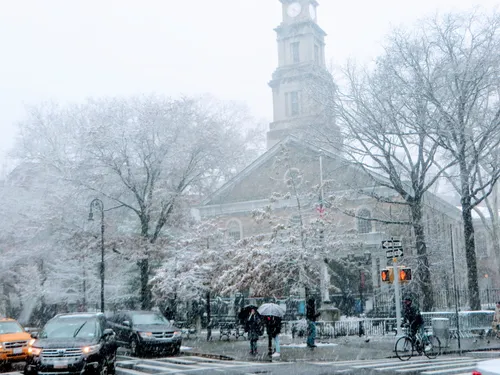 A wintertime view of the park and St. Mark's Church