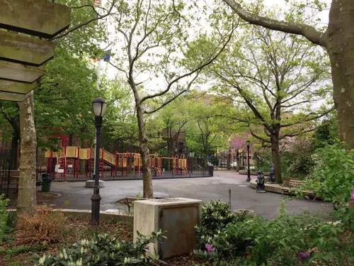 The park is surrounded by dense trees and greenery