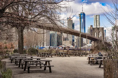 Picnic tables offer wintertime views of the Brooklyn Bridge and One World Trade Center