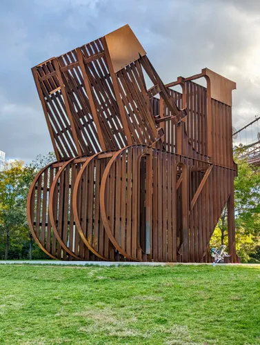 Nicholas Galanin's Corten steel sculpture spells out the word LAND