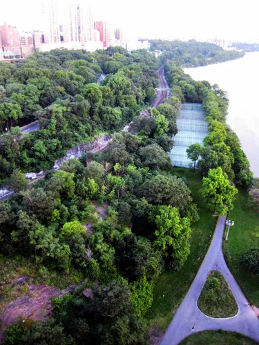 Aerial view of the park's lush greenery along the Hudson River shoreline