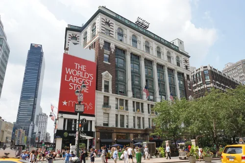 Macy's flagship store rises above the busy streets of Herald Square