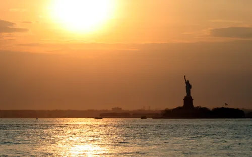 The Statue of Liberty can be seen from the park