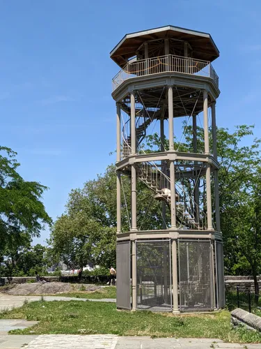 Mount Morris Fire Watchtower standing tall against blue sky