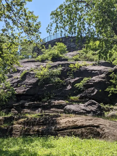 Natural rock outcroppings surrounded by lush greenery